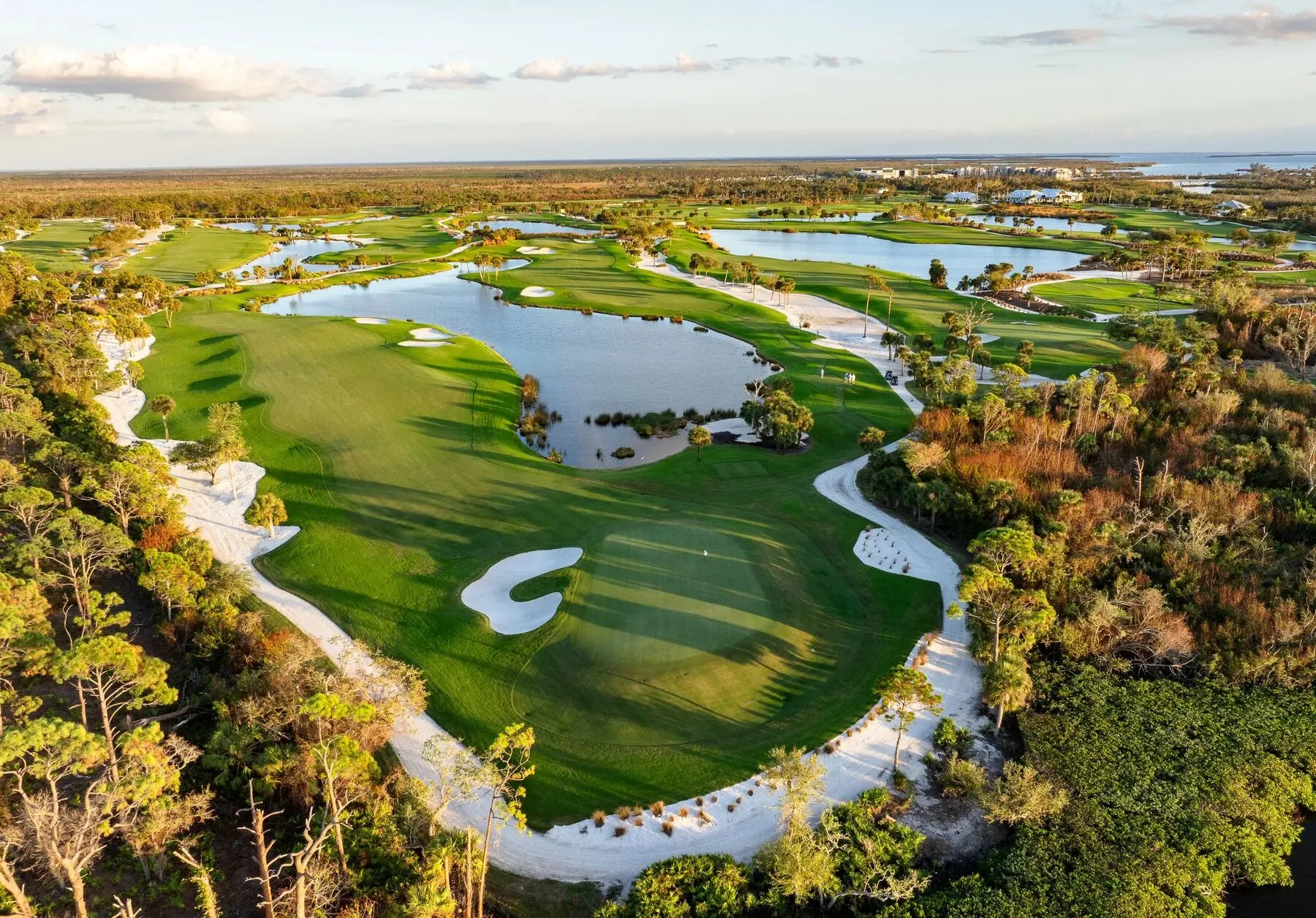 Green and water hazard at Coral Creek Club