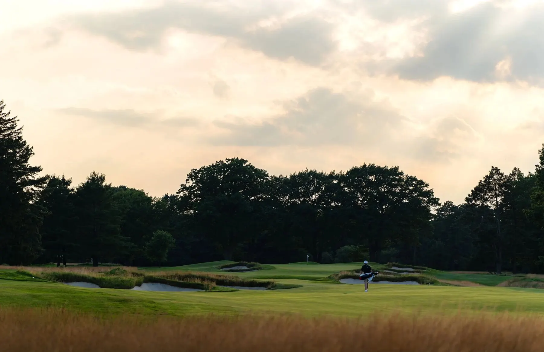 Green with condo towers beyond at Toronto Golf Club